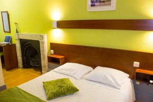 
Un ou plusieurs lits dans un hébergement de l'établissement Hotel Estoril Porto
