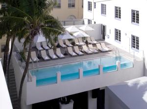 an aerial view of a hotel with a swimming pool at Hotel Breakwater South Beach in Miami Beach