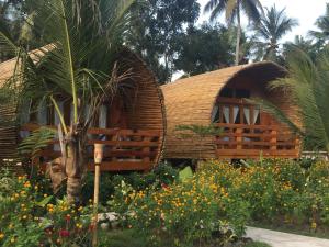 Сад в Lagoona Beach Bungalows - Eco Stay