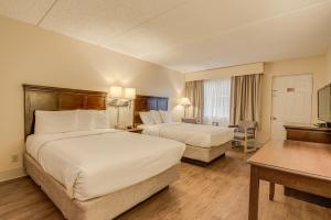 Lova arba lovos apgyvendinimo įstaigoje Bonnie Castle Resort & Marina