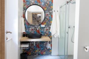a bathroom with a mirror and a sink at Sweet Dreams-Old Town in Split