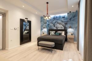 a bedroom with a bed and a painting on the wall at Sweet Dreams-Old Town in Split +37 photos
