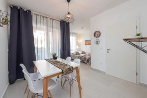 Kuchyň nebo kuchyňský kout v ubytování Villa Isola apartments