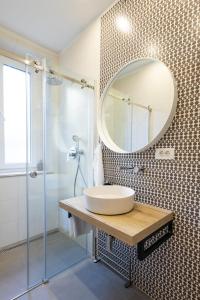 a bathroom with a sink and a mirror at Sweet Dreams-Old Town in Split