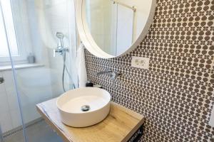 a bathroom with a sink and a mirror at Sweet Dreams-Old Town in Split