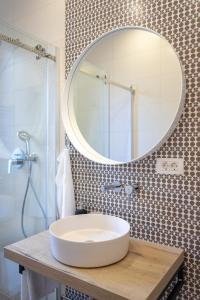 a bathroom with a sink and a mirror at Sweet Dreams-Old Town in Split
