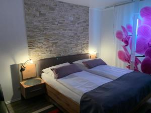 Postel nebo postele na pokoji v ubytování Haus Encore