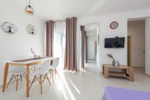 TV a/nebo společenská místnost v ubytování Villa Isola apartments