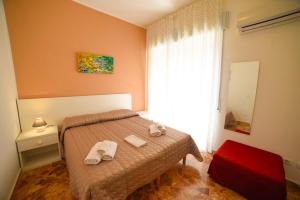 Postel nebo postele na pokoji v ubytování B&B Siracusa Holidays
