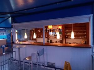 The lounge or bar area at Heliotopos Apartments