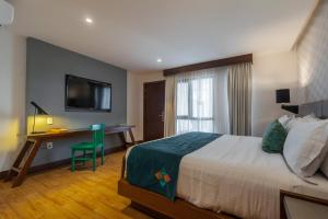 Postel nebo postele na pokoji v ubytování FCH Hotel Expo Adults only + 37 fotografií