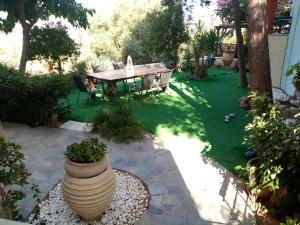 A garden outside Heliotopos Apartments