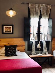 Postel nebo postele na pokoji v ubytování Hotel Real de Piedra