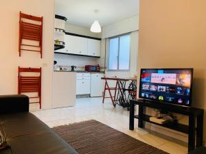 Apartamento en el centro de Pontevedra tesisinde bir televizyon ve/veya eğlence merkezi