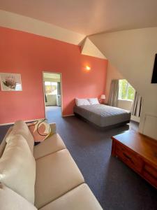 Ένα ή περισσότερα κρεβάτια σε δωμάτιο στο Howards Mountain Lodge