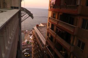 an aerial view of the ocean from a building at Amir flat -ميامي- عائلات فقط in Alexandria