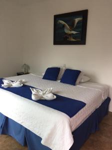Voodi või voodid majutusasutuse Hotel Cally toas