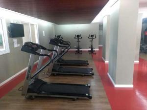 a row of exercise bikes in a gym at STUDIO TOP IDEA INTERLAGOS in Sao Paulo