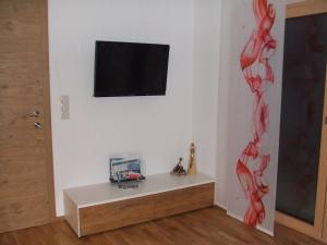 TV a/nebo společenská místnost v ubytování apArtment kAtrin & gerhArd