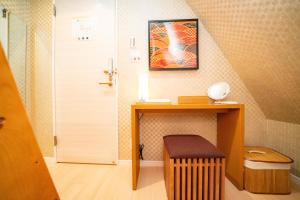 A television and/or entertainment centre at kaguya asakusa Women only guest house