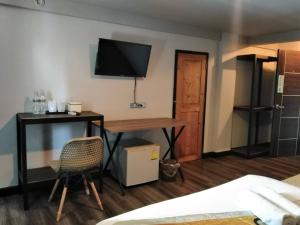 Kuchyň nebo kuchyňský kout v ubytování Pimpimarn Hotel