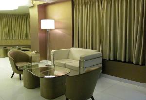 Posezení v ubytování Cocoon Luxury Business Hotel