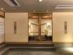 Postel nebo postele na pokoji v ubytování Hotel Pearl City Kobe