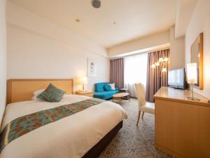 Postel nebo postele na pokoji v ubytování President Hotel Mito