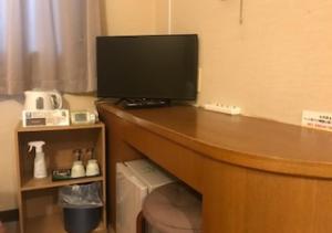 TV a/nebo společenská místnost v ubytování Business Hotel Goi Hills