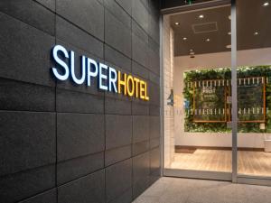Certificat, premi, rètol o un altre document de Super Hotel Marugame Ekimae