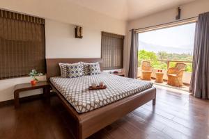 Gallery image of StayVista's Santoni Farms - Riverside Bliss with Pool, Orchard & Activities in Karjat