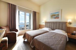 Voodi või voodid majutusasutuse Hotel Hermes toas