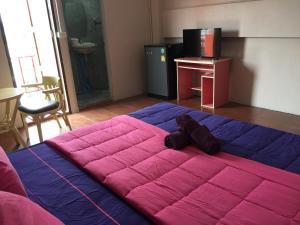 Postel nebo postele na pokoji v ubytování SMILE HOME GUESTHOUSE