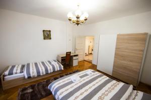 Postel nebo postele na pokoji v ubytování Apartman Kuća 150