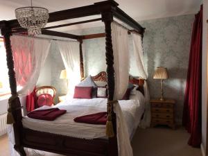 Llit o llits en una habitació de Bedford Lodge
