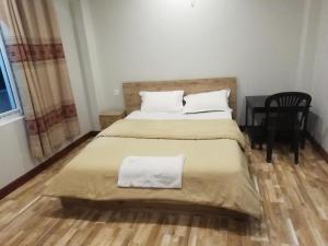 Voodi või voodid majutusasutuse Manaslu Homestay toas