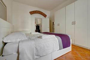 En eller flere senge i et værelse på Casa da Suite Historia