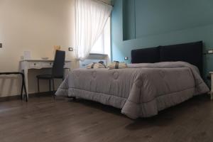 Postel nebo postele na pokoji v ubytování Maison Gentile