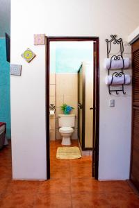 Ванная комната в Rual's Hotel