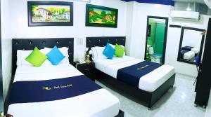 Postel nebo postele na pokoji v ubytování Hotel Luna Azul