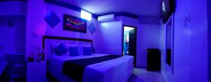 Postel nebo postele na pokoji v ubytování Hotel Luna Azul
