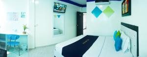 Postel nebo postele na pokoji v ubytování Hotel Luna Azul