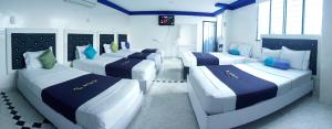 Postel nebo postele na pokoji v ubytování Hotel Luna Azul