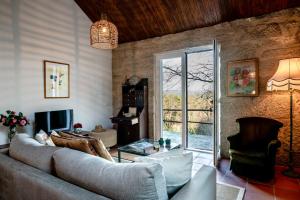 Χώρος καθιστικού στο Quinta das Lamas - Oak Tree House