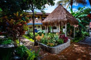 Κήπος έξω από το Hostal Jardín Escondido