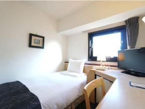 TV a/nebo společenská místnost v ubytování Hotel The Centre Utsunomiya