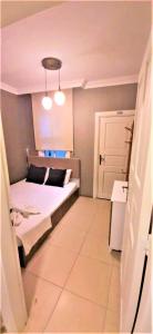 a bedroom with a bed and a door in it at valide-maide hotel in Istanbul +55 photos