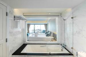 Posezení v ubytování Methavalai Hotel