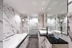 Koupelna v ubytování Methavalai Hotel