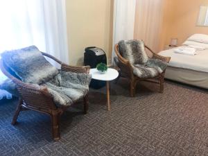 Postel nebo postele na pokoji v ubytování Hotel Yes
